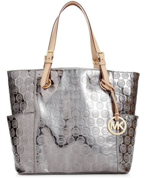 michael kors purse with silver hardware|Michael Kors silver tote bag.